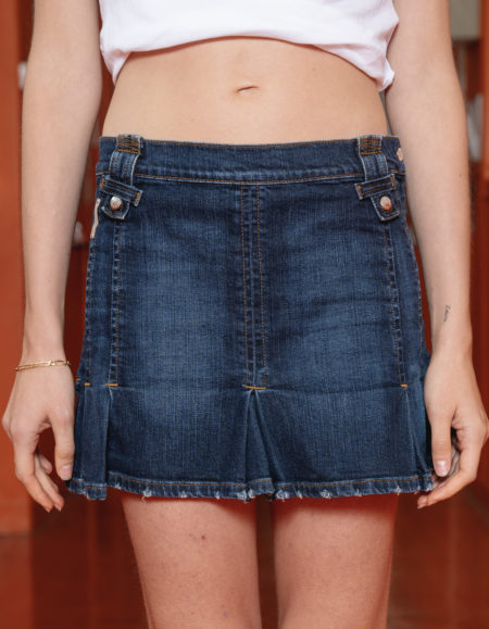 Shop the D&G denim skirt, a timeless vintage piece blending casual charm and designer elegance. Perfect for versatile everyday looks. Discover it now!
