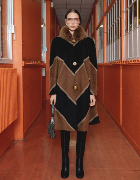 Shop the luxurious vintage fur coat, perfect for adding warmth and elegance to your winter wardrobe. Premium craftsmanship, timeless appeal.